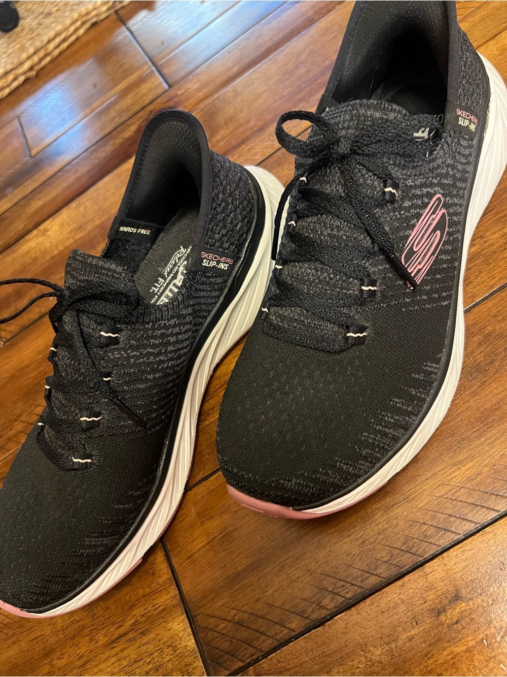 Skechers Women's Black Knit Athletic Sneakers with Pink Trim